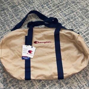 Champion Tan and Navy Duffel Bag